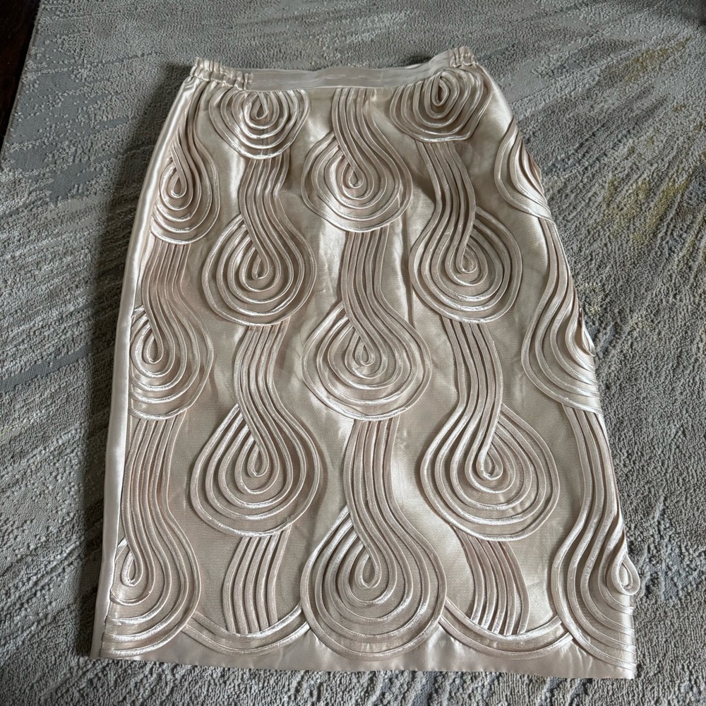 Elegant Cream Midi Skirt with Sculpted Swirl Texture